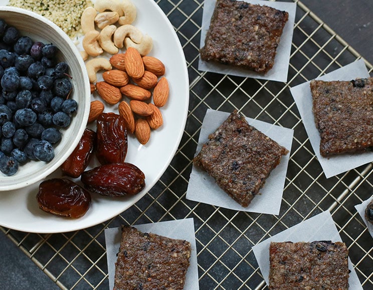 Get your energy on the go with these raw, protein-packed blueberry Copycat RX Bars! Never buy an energy bar again! this diy cashew-blueberry bar has it all.