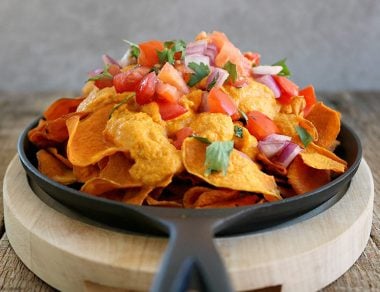 Drizzle this creamy nacho cheese sauce over everything from tacos to veggie chips! Include action shot with crispy sweet potato chip!