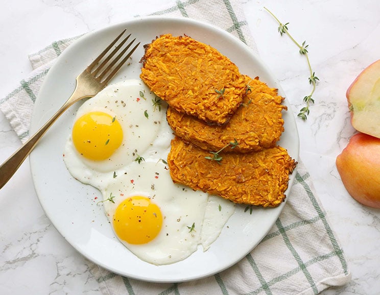 Sweet potatoes with a hint of cheesy flavor make these oven-baked hash browns a healthy step above the rest.