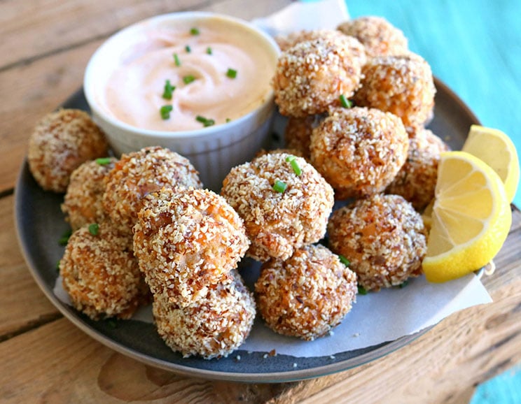 Salmon croquettes are coated in almond meal and baked for a crispy treat that only tastes fried!