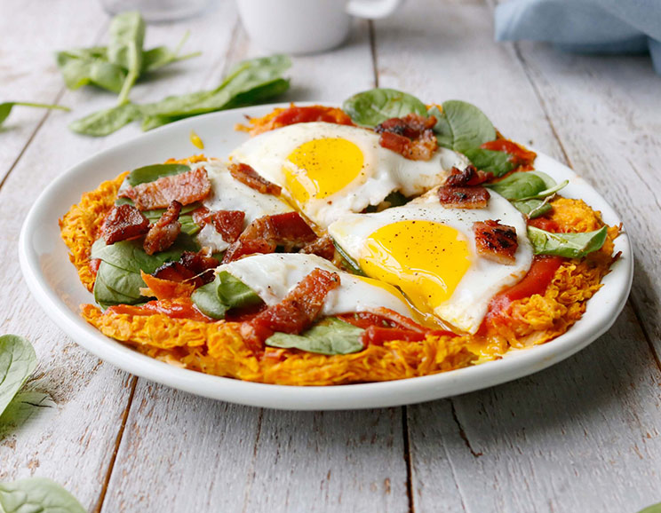 Enjoy pizza for breakfast with this egg, spinach and bacon pie served on a sweet potato crust.