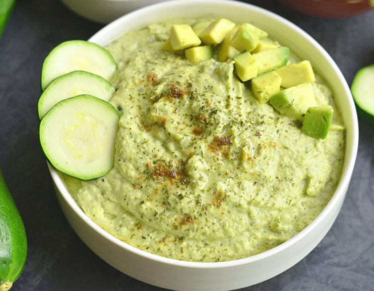 Avocado gets blended with zucchini, tahini, and zesty lemon for an uber creamy, bean-free hummus.