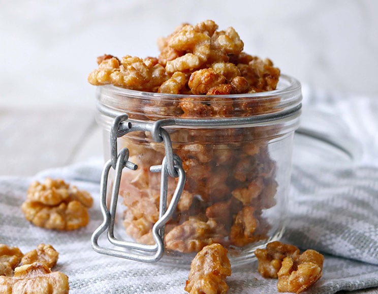 Satisfy a snack craving with these sweet, 3-ingredient honey roasted maca walnuts! This recipe is easy to make in large batches ahead of time.