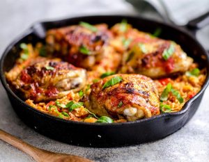 One-Pan Crispy Chicken Thighs + Tomato Cauliflower Rice (Paleo)