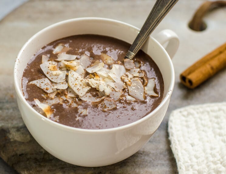 Cozy up to a cup of dairy-free hot chocolate topped with deliciously toasted coconut chips.