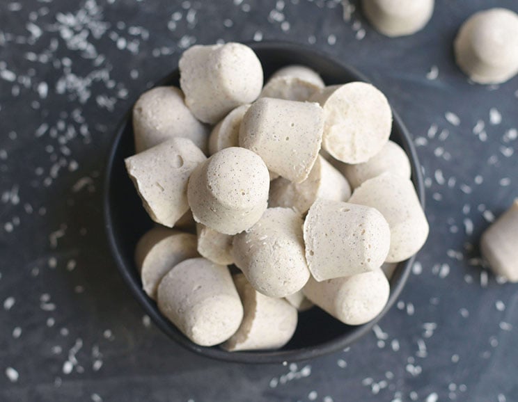 Loaded with coconut cream and coconut butter, and lightly sweetened with vanilla, these fat bombs tame a sugar craving with their silky smooth flavor.