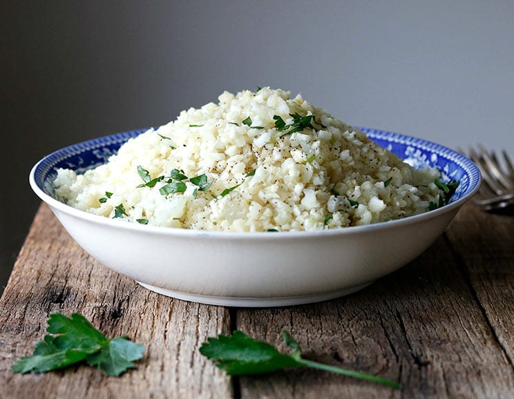 In this quick and easy recipe, ingredients are kept simple for a cauliflower “rice” that blends seamlessly with any of your favorite sauces and spices.