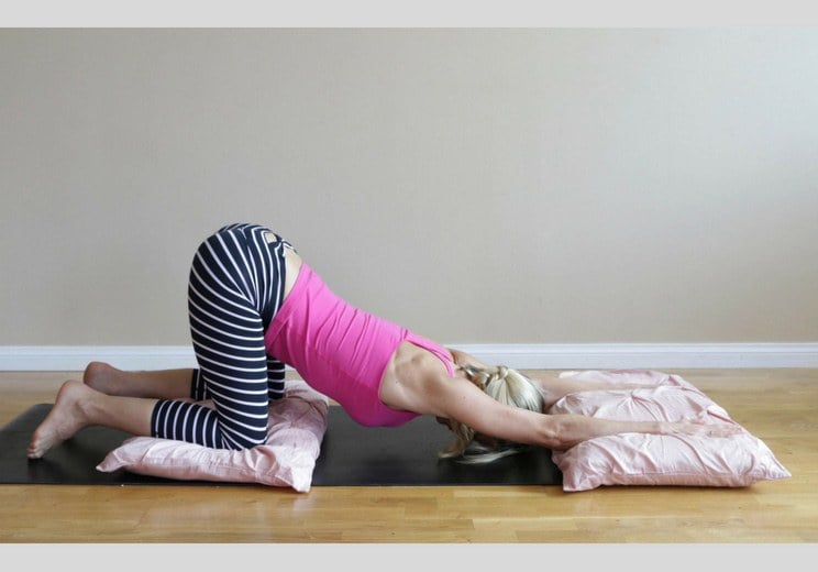 7 Hip + Back Stretches to Help You Sleep Faster Than Ambien