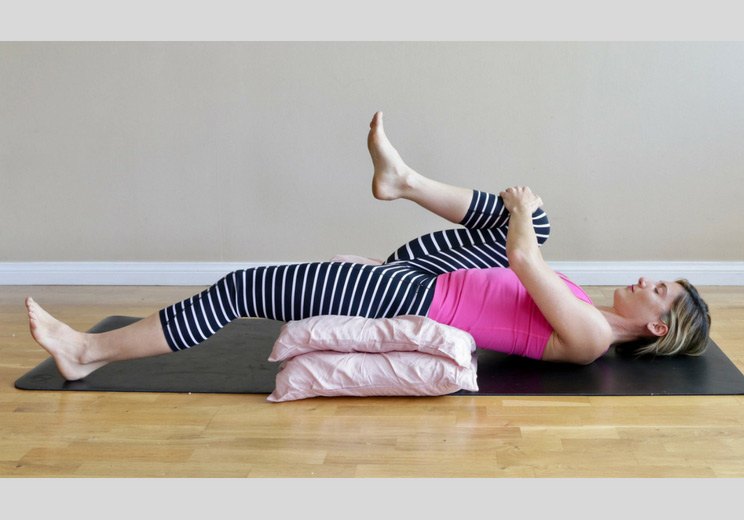 7 Hip + Back Stretches to Help You Sleep Faster Than Ambien