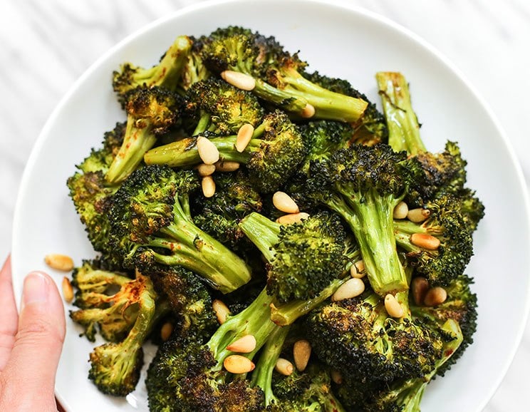 For a deliciously healthy side dish, oven-roast broccoli florets until tender and top with crunchy toasted pine nuts!