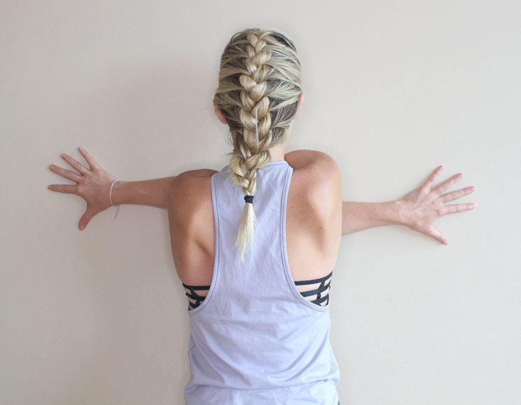 9 Easy Wall Stretches to Fix Tight Shoulders 12