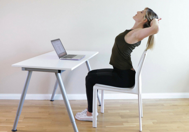9 Seated Stretches to Release Neck + Back Pain