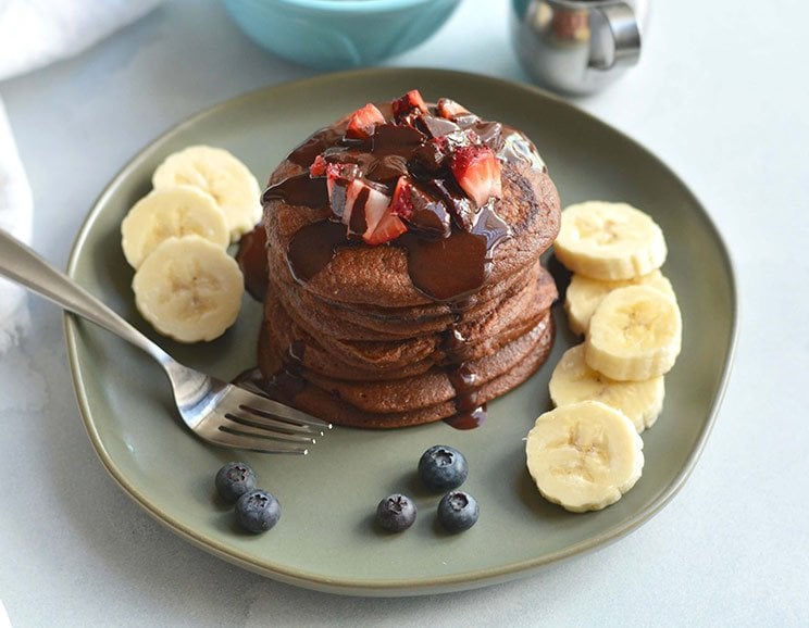 Craving chocolate in the morning? Try these Nutty Choco-Nana Paleo Pancakes you can make in just 20 minutes.
