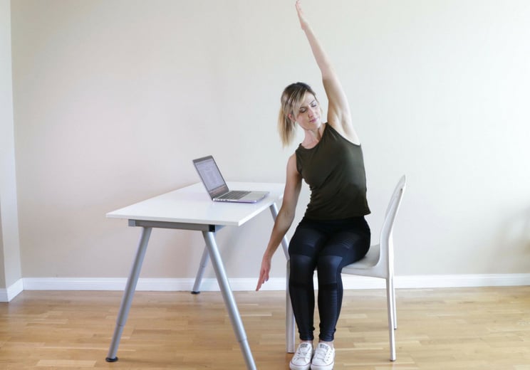 9 Seated Stretches to Release Neck + Back Pain