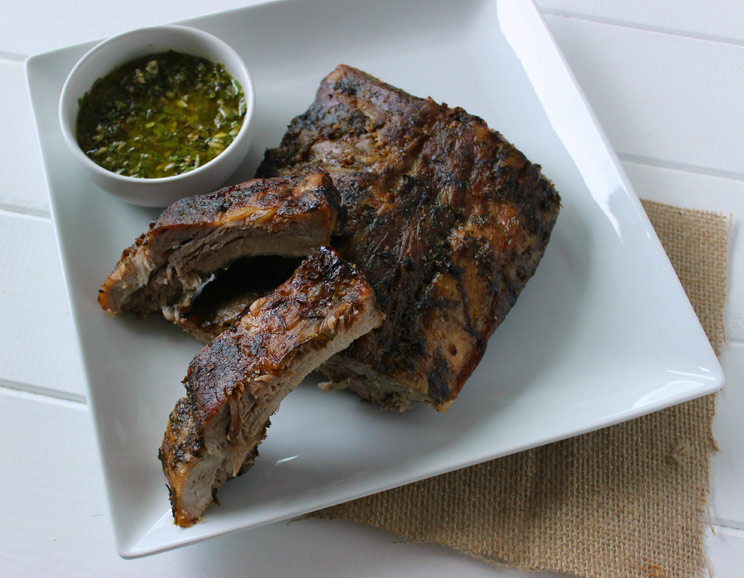 These baby back ribs are marinated in a fresh chimichurri sauce and slow roasted for fall-off-the-bone tender meat.