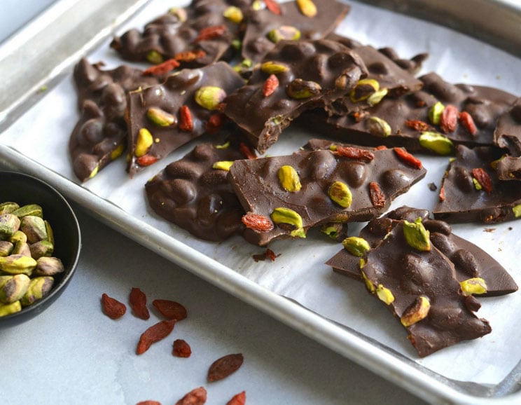 Boost your energy with this Dark Chocolate Bark made with roasted pistachios and goji berries for a treat that’s equal parts sweet and salty.