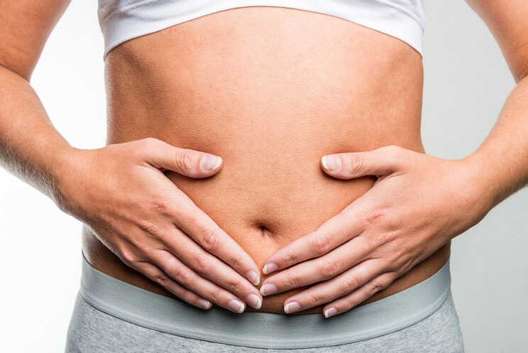 woman stomach and digestion 
