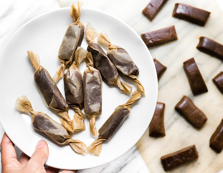 Firm but chewy, tart yet sweet, these apple cider coconut oil caramels are the perfect homemade treat. The candied confection of our dreams!