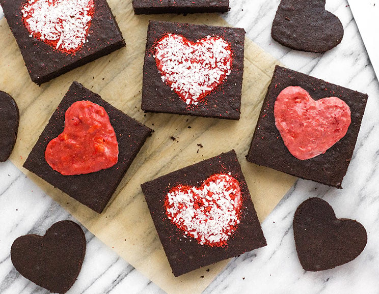 Bake up these heart-shaped brownies filled with strawberry “frosting” and shredded coconut. It feels like love at first bite!