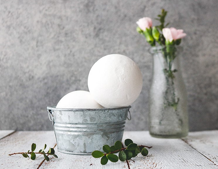 Soak away nasty flu and cold symptoms with a simple bath bomb recipe featuring soothing essential oils. It's the aromatherapy you need to survive the winter!