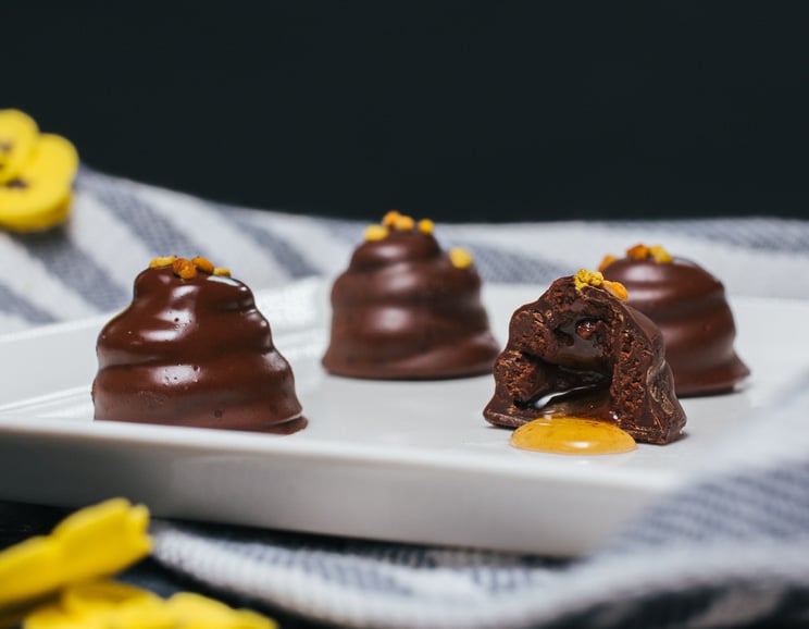 These towering chocolate beehives really celebrate bees: They feature a raw honey ganache and are sprinkled with bee pollen.
