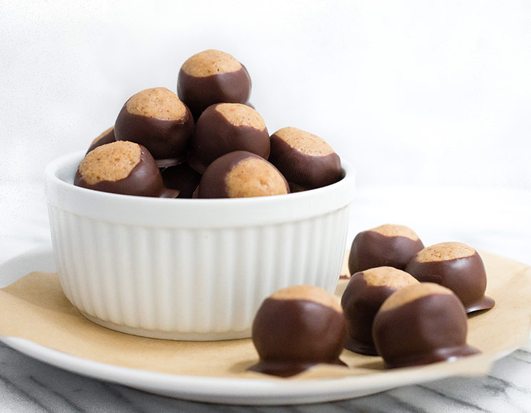 Whip up a batch of no-bake buckeyes for a holiday dessert that’s both creamy and decadent. Dreams are made of this candied confection!