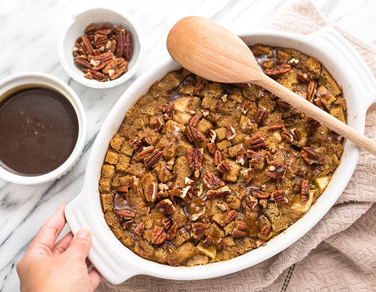 Paleo bread gets smothered in warm spices, fresh fruit, and chopped pecans for a decadent holiday treat. You'll be coming back for seconds, thirds, and fourths!