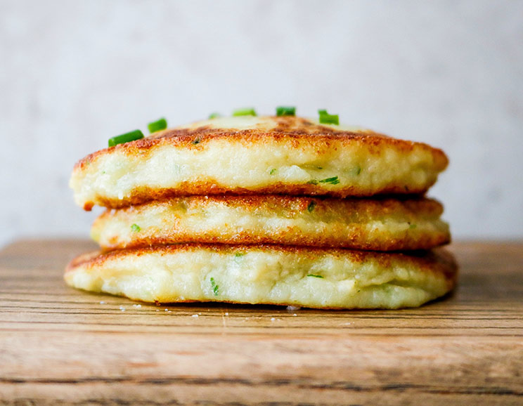 Take everything you love about mashed potatoes and transform them into soft cauliflower cakes. They're like golden pillows of low-carb potatoes, but better!