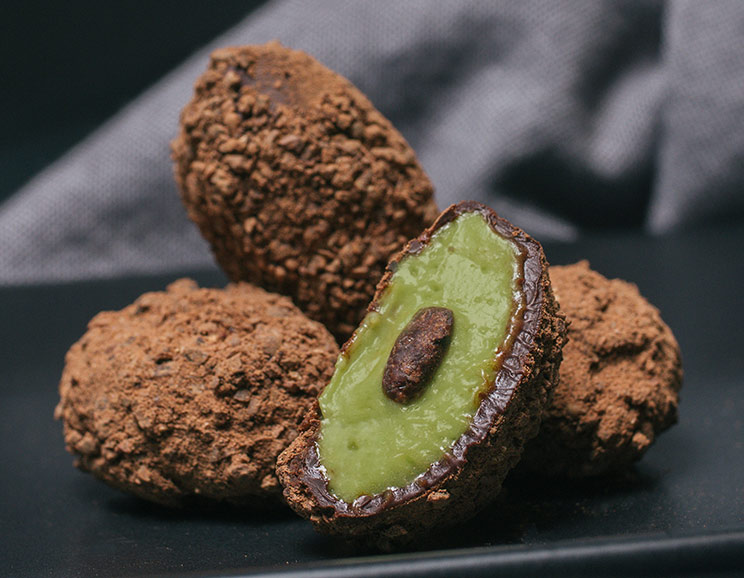 Silky, rich, and chock-full of healthy fats, these avocado truffles fuse the creaminess of avocado with the bittersweet flavors of cacao, dark chocolate, and carob powder.