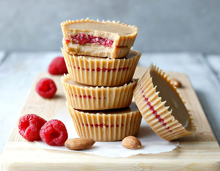 Filled with real raspberries and creamy almond butter, these keto PB&J cups are a healthy, guilt-free treat.