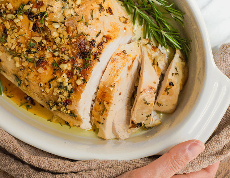 Say goodbye to dried out turkey breast because this herb-roasted recipe locks in all the drippings. We're salivating just looking at these photos!