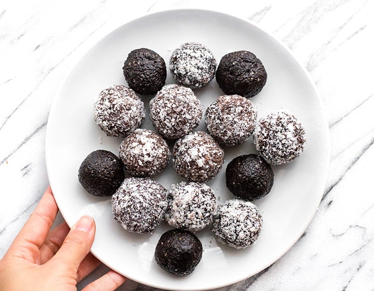 Boost your energy with these keto-friendly fat bombs featuring raw cacao and coconut oil. It's equal parts protein and chocolatey goodness!