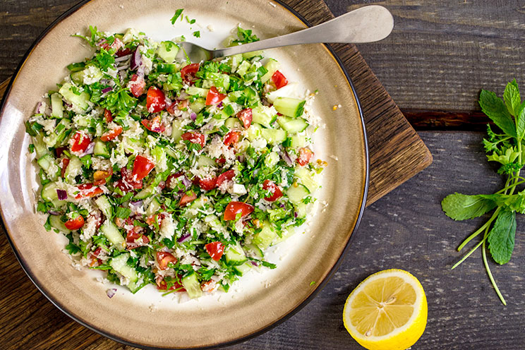 Juicy tomatoes, cucumbers, red onion, mint and parsley come together in this fresh salad tossed in extra virgin olive oil and lemon.