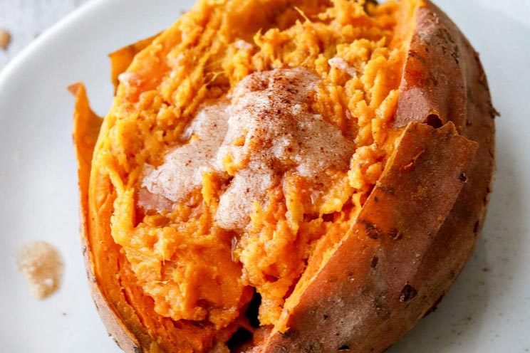 Prepare yourself for Instant Pot magic with these 20-minute sweet potatoes smothered in buttery maple ghee.