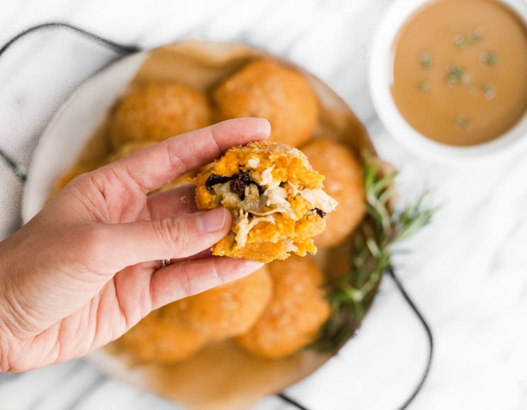 Serve up Thanksgiving dinner in a bite-sized ball using sweet potatoes, turkey stuffing, and crispy pork rinds. Best part is the pork rind coating!