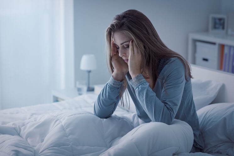 woman suffering from lack of sleep and insomnia