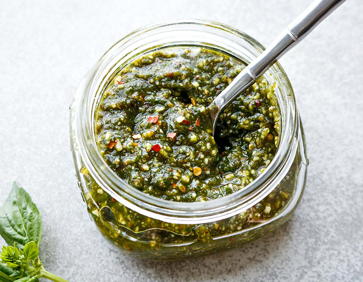 Add instant flavor to your next dish using this Spicy Pesto made with raw almonds, nutritional yeast, and fresh herbs!