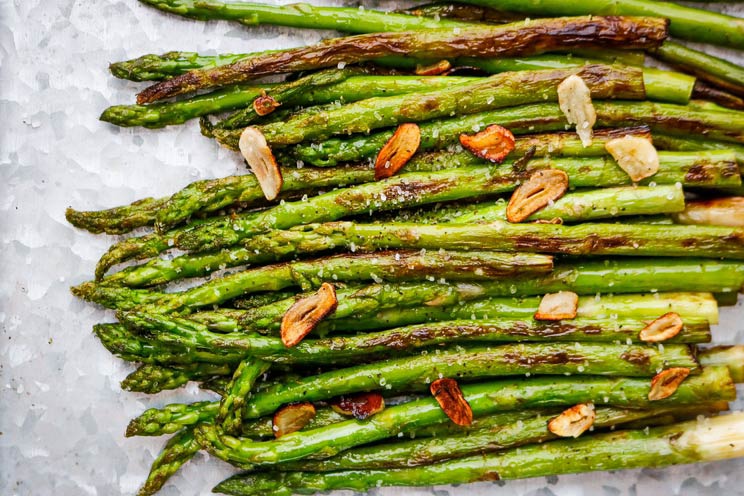 Step aside steamed vegetables, this one-pan asparagus recipe shines with buttery ghee and crispy garlic shavings!