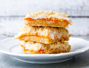 Whip up these keto-friendly crumb bars packed with coconut cream, apricot filling, and a crunchy crumble on top.
