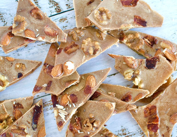 Curb multiple cravings with this sweet and salty brittle packed with creamy almond butter and smokey bacon. Who says candy isn't allowed on the Paleo diet?