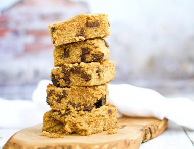 Indulge both your cookie and cake cravings with these chocolate chip-studded coconut flour cookie bars.