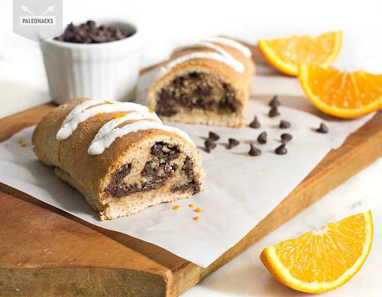 Combine chocolate and orange together in a simple loaf topped with dairy-free coconut icing. This loaf comes studded with natural sweet flavors