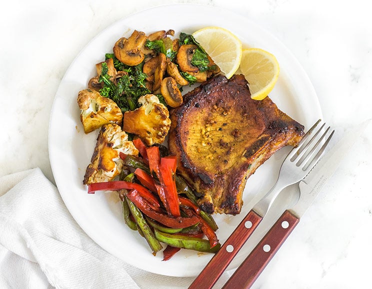These one-pan, blackened skillet pork chops mingle with five different sautéed veggies for a fuss-free meal. Reason #1,069 why you need a cast-iron skillet.