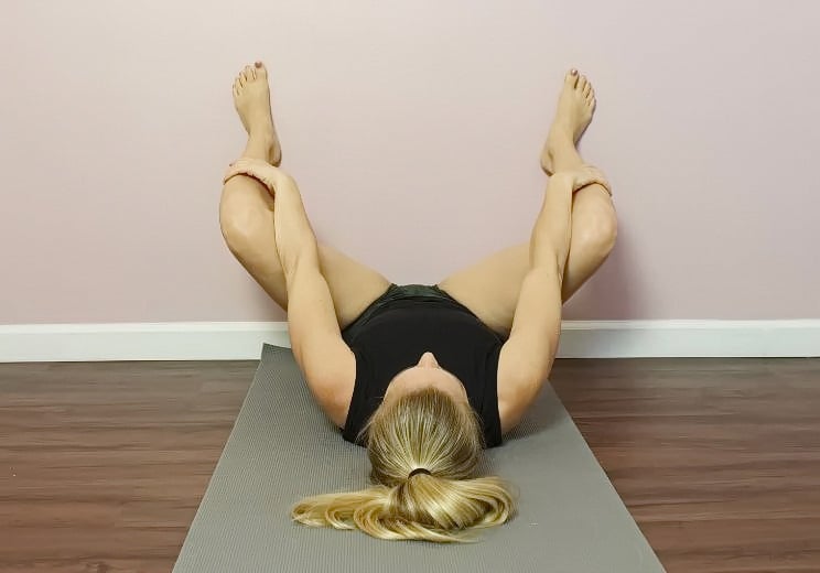 9 Soothing Wall Stretches to Release Low Back & Hip Pain