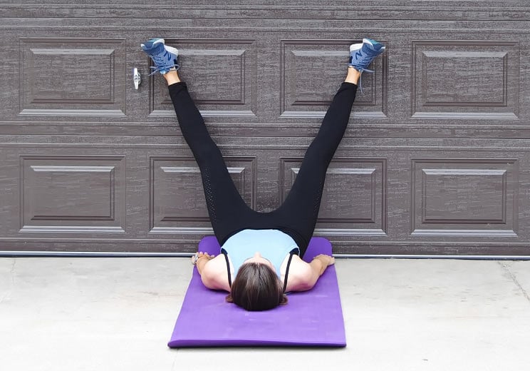 4 Spinal Stretches You Can Do Against a Wall (Soothe Back Pain, Increase Mobility)