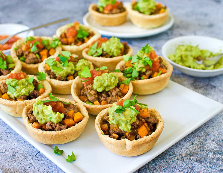 Make your tacos in a muffin tin and load them up with a savory ground beef and sweet potato filling. Eat your tacos in pie form - you won't regret it!