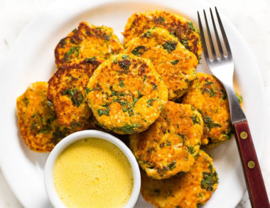 Sweet potato and kale come together to make a crispy fritter just begging to be dipped in a creamy garlic aioli!