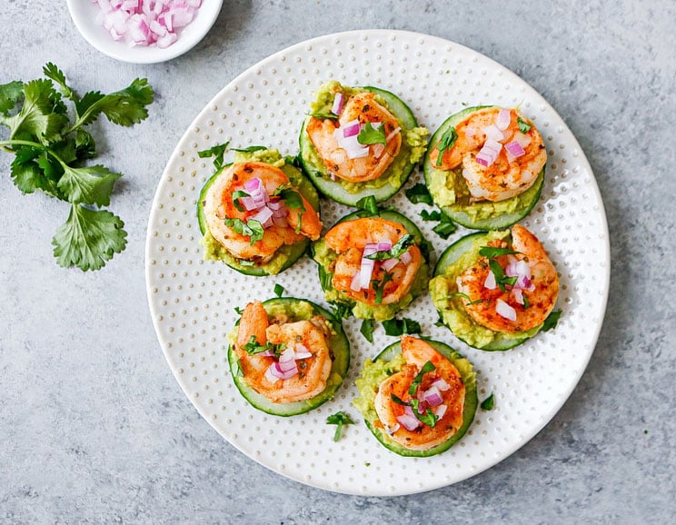 Stack cucumber rounds with zesty shrimp and avocado for a healthy and indulgent snack. Step aside deviled eggs, these bites are the new tasty teaser in town!