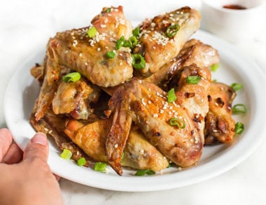 This super yummy Asian Chicken Wings recipe is a healthy substitute for those greasy take-out ones. Warning: these wings are highly addictive!