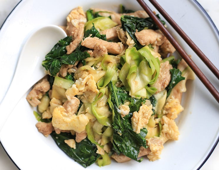 Gluten-free and low-carb, this classic Pad See Ew Thai dish is made Paleo-friendly with sliced zucchini noodles.